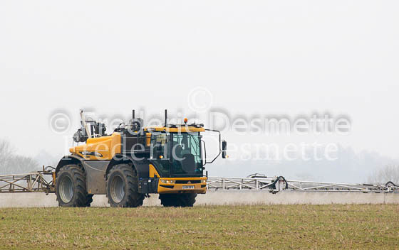 Tractor spraying a crop 4