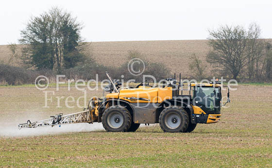 Tractor spraying a crop 5