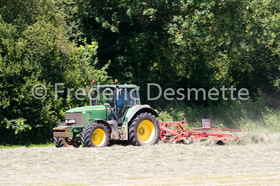 Tractor turning up hay-1