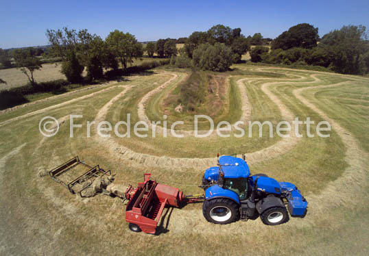 tractor baling hay -85